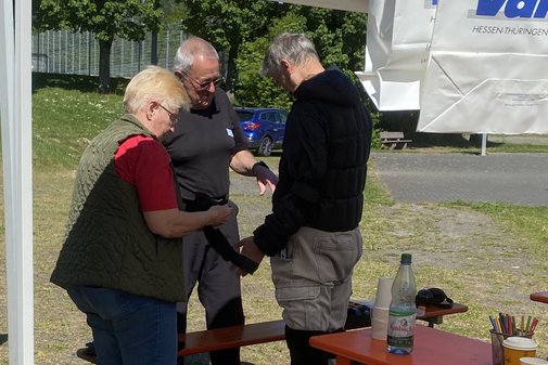 Zwei Männer und eine Frau