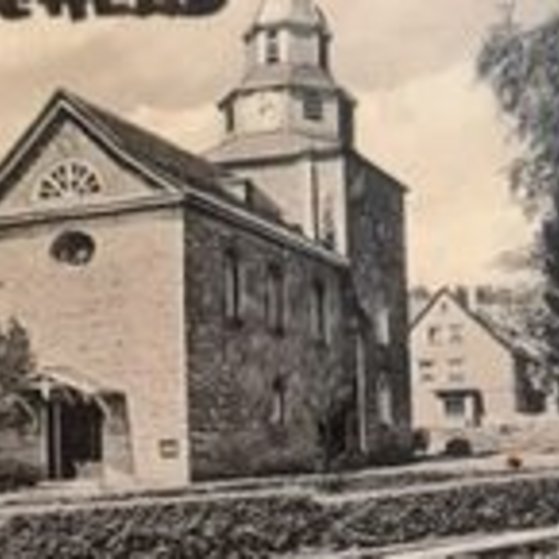 Kirche und Wappen Niederscheld